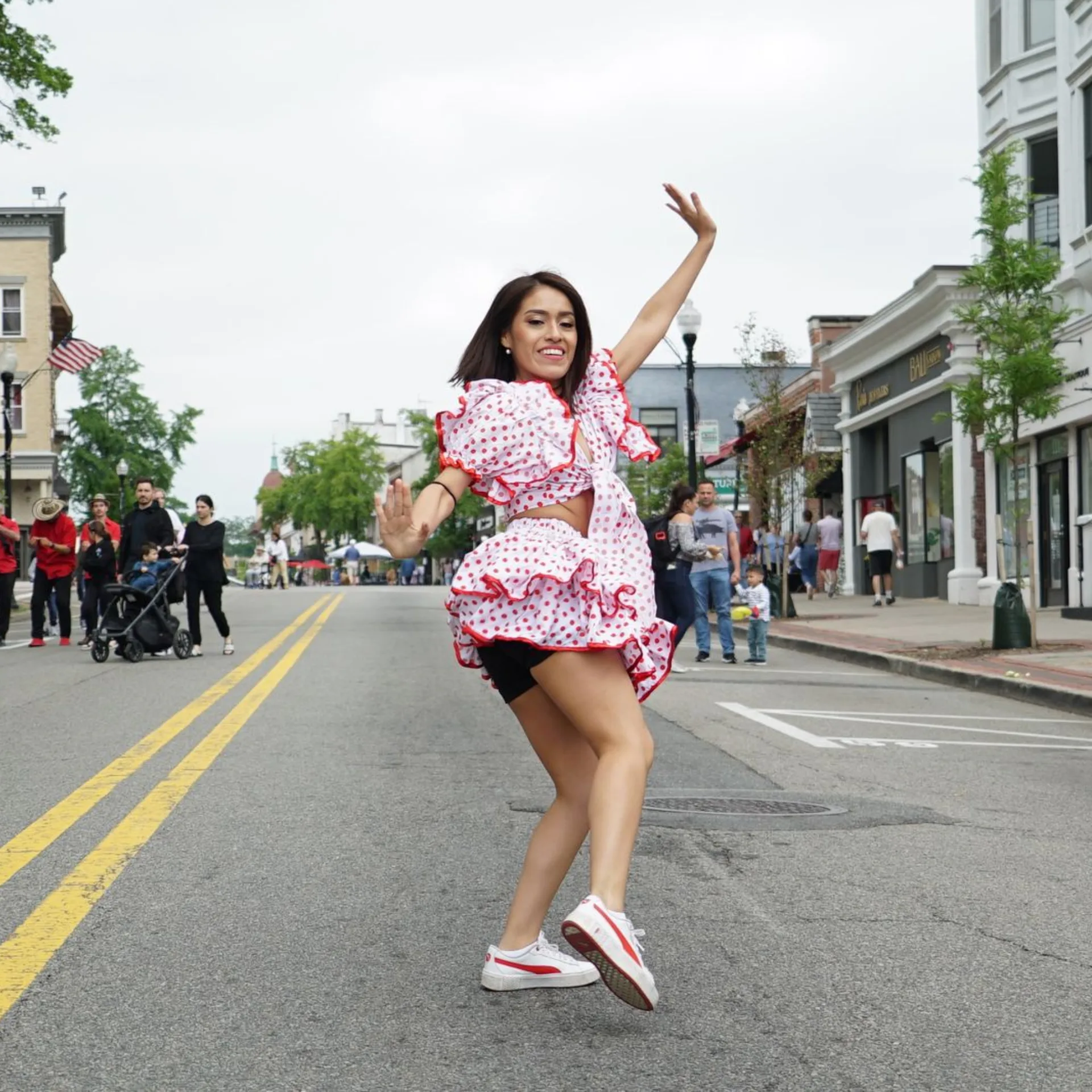 Woman dancing in street — Growth Builder